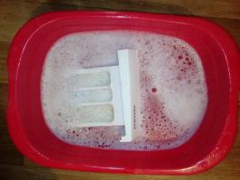 Vyčistiť práčku: odstrániť znečistenie z odpadovej filter, mierka, hrdzavé plaku