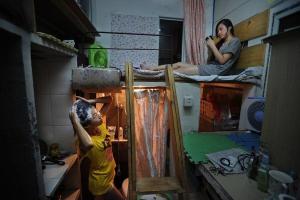 Kapsule byty v Číne, alebo ako prežiť v krabici spod chladničky